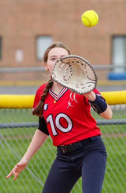 Brookfield East's Elizabeth Lacey (10) gets an out at first during the game at Germantown, Tuesday, April 23, 2024.